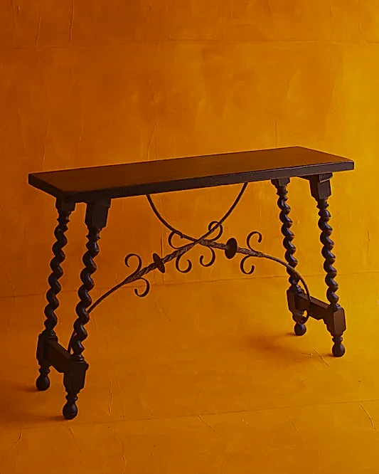 BAROQUE SPANISH EBONIZED CONSOLES w. FORGED IRON TRESTLE LEG