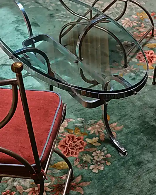 BENT CHROME AND GLASS OVAL COFFEE TABLE